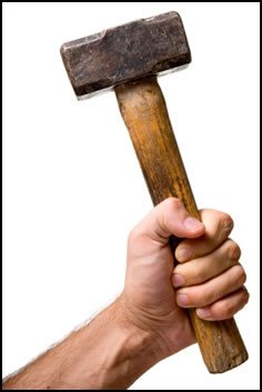 Improve grip strength by swinging a heavy sledgehammer.