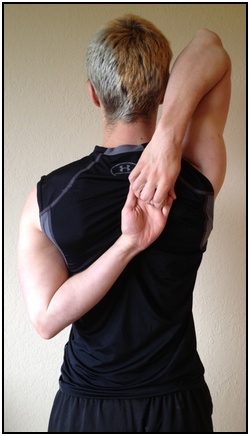 Shoulder stretches, hands grabbing behind the back.