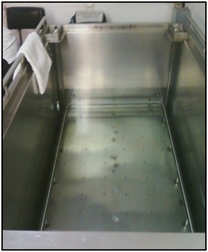 The hydrostatic weighing water tub inside the BodyFatTest truck.