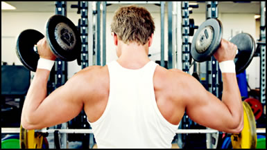 Weight training super sets with a shoulder press. The next movement might be shoulder circles or a barbell press.